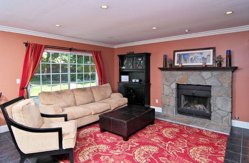 living room with couch and fireplace