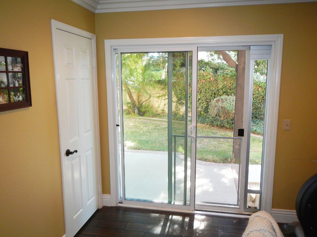 view through sliding door to outside patio