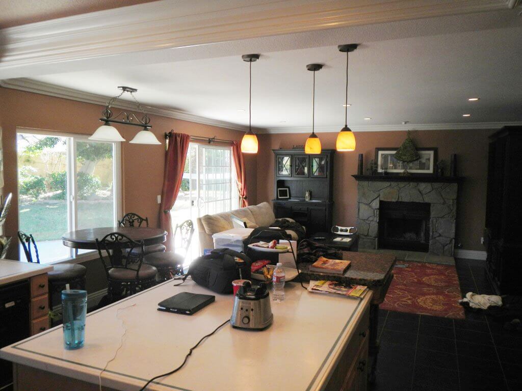 view of living room through kitchen