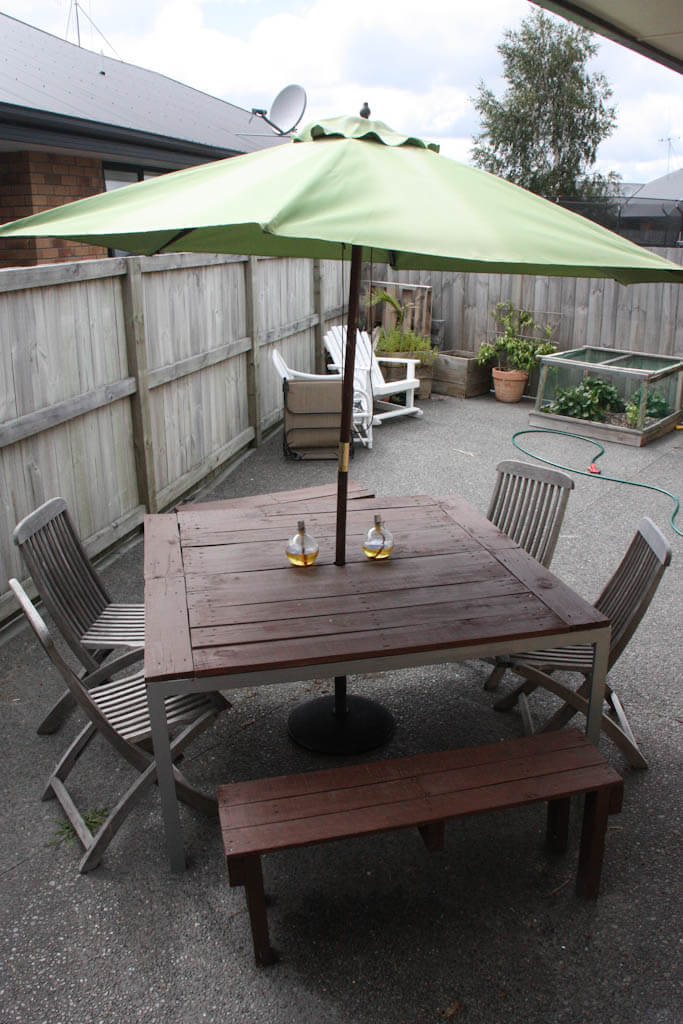 Outdoor patio with umbrella table and chairs