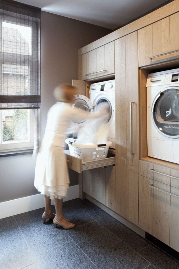 laundry room wall cabinets with woman