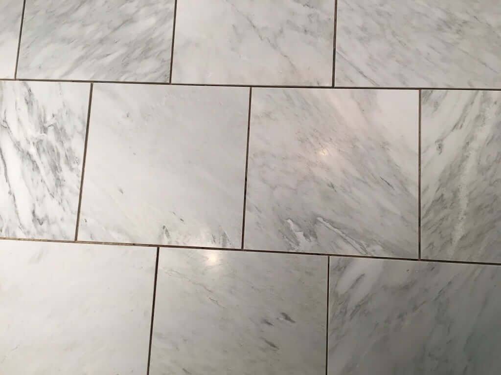 Marble tile laid out in brick pattern