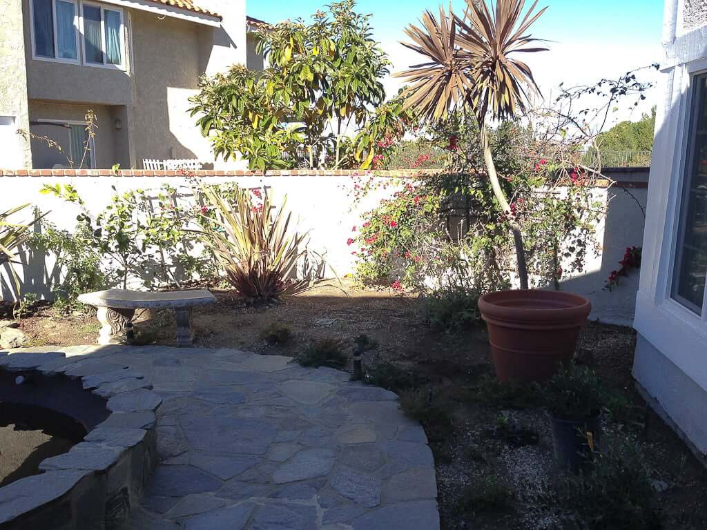 flagstone patio with courtyard landscaping in background