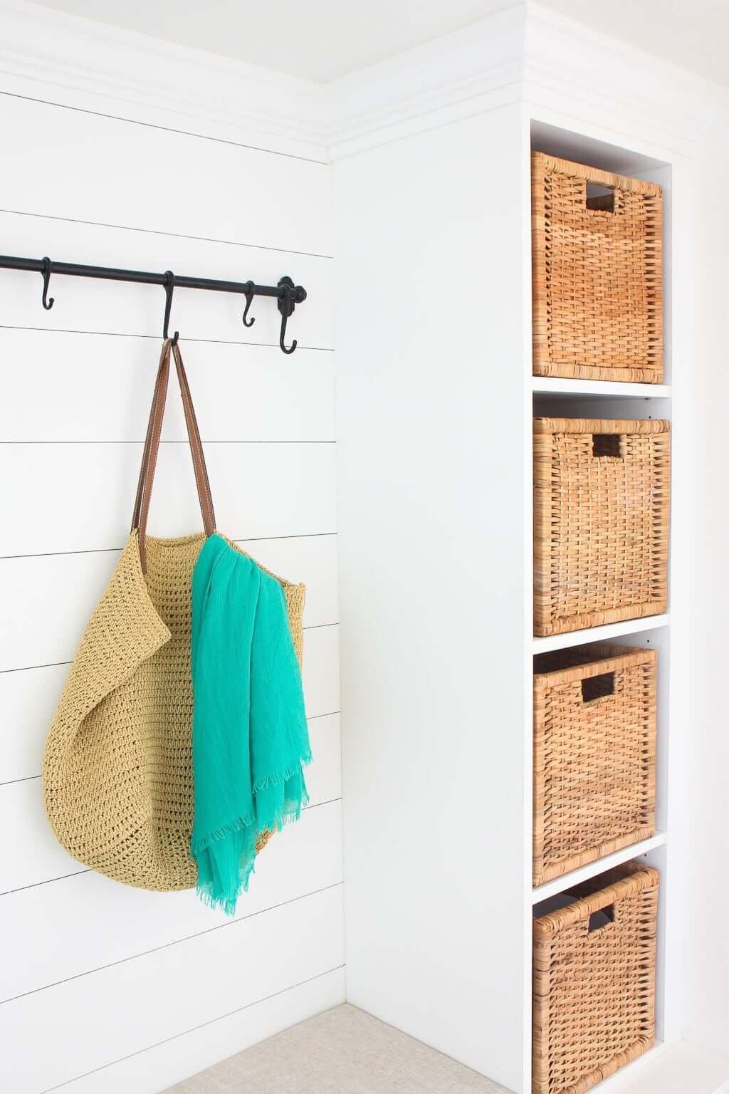 mudroom bench with woven storage entryway baskets in IKEA mudroom cubbies