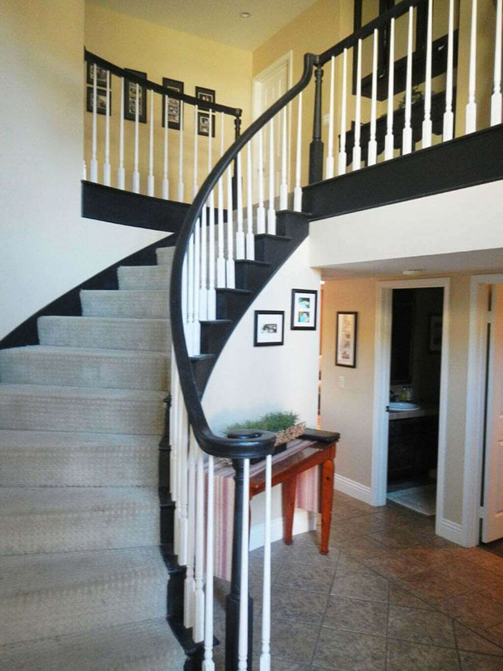 curved stairway going upstairs 
