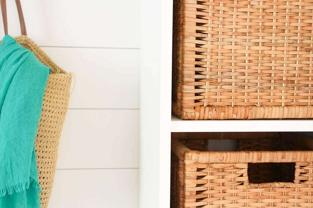 woven storage mudroom baskets in cubbies