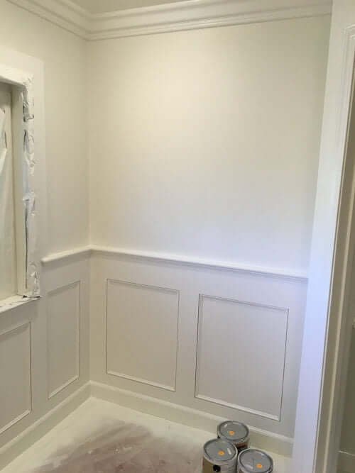 Cozying Up Our Bathroom Walls with Wainscoting.