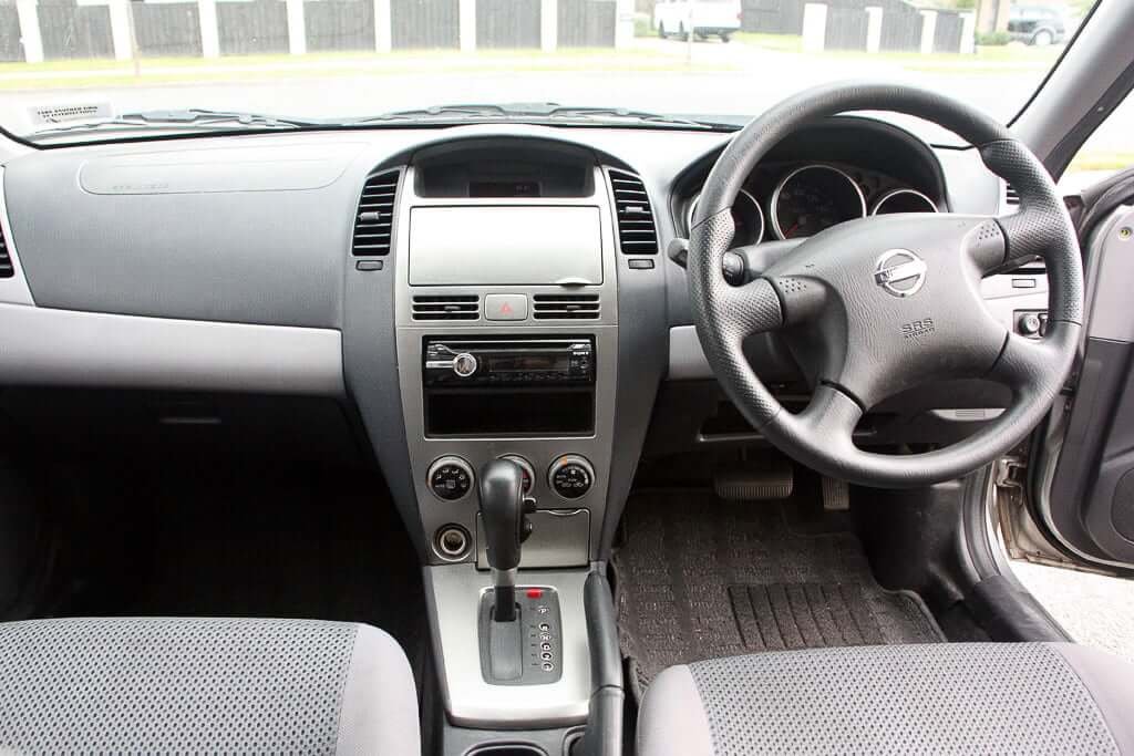 inside of Nissan wingroad car