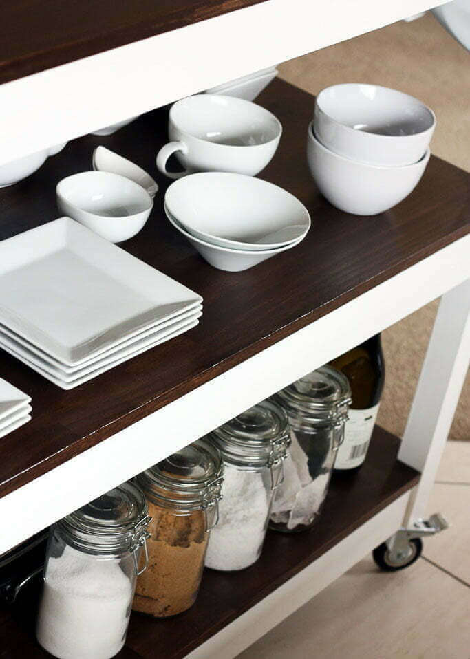 Kitchen island cart with dishes