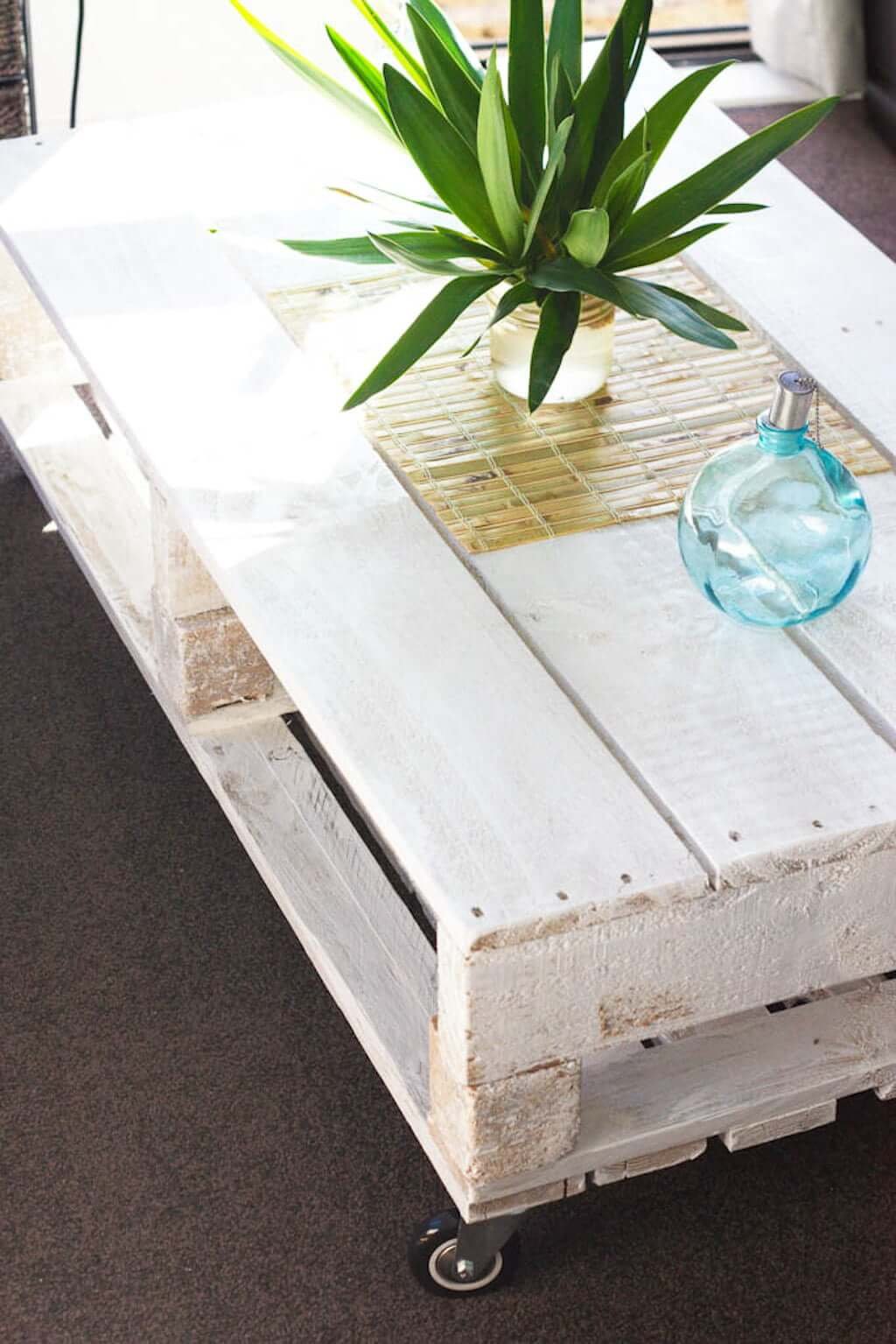 Wooden pallet coffee table with wheels