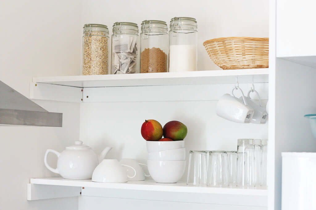 Shelves with dishes, cups and tea pot