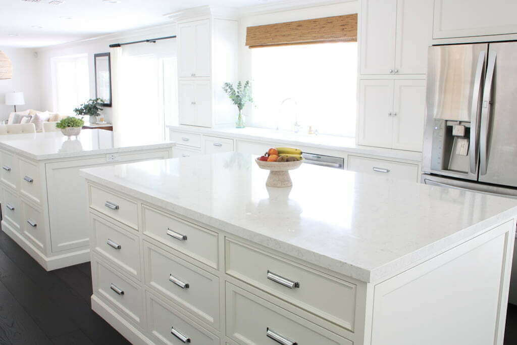 white kitchen with islands and kitchen appliance cabinets