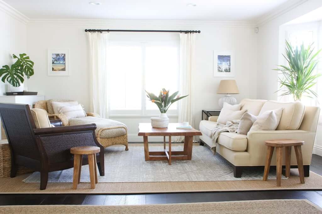 Living room with older furniture including couch chaise and chair