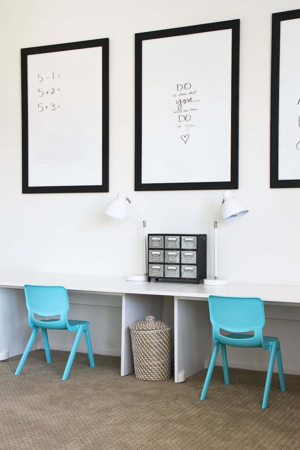 three glass dry erase board for kids in homework area above kids desks