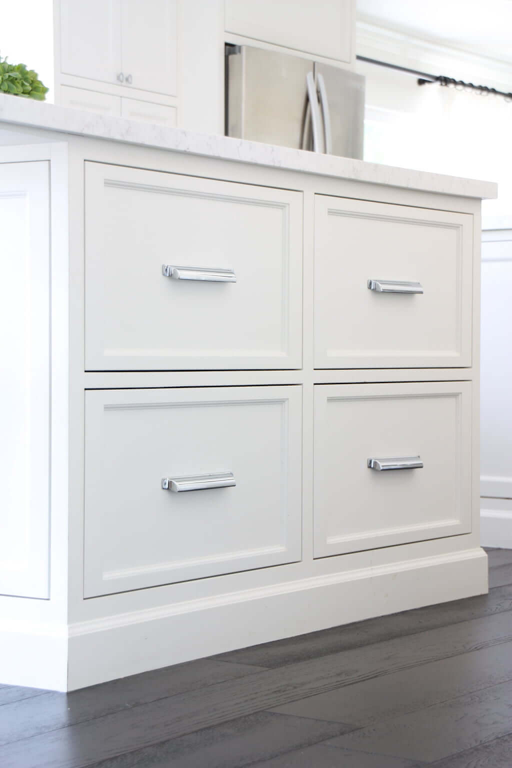 white kitchen island drawers, extra deep drawers with chrome drawer pulls