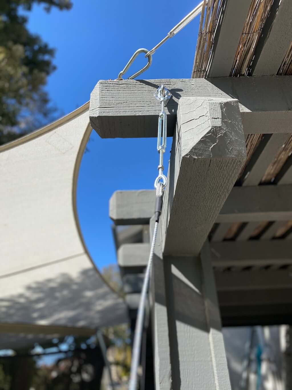 metal kids backyard zipline hardware installed without trees, into arbor post