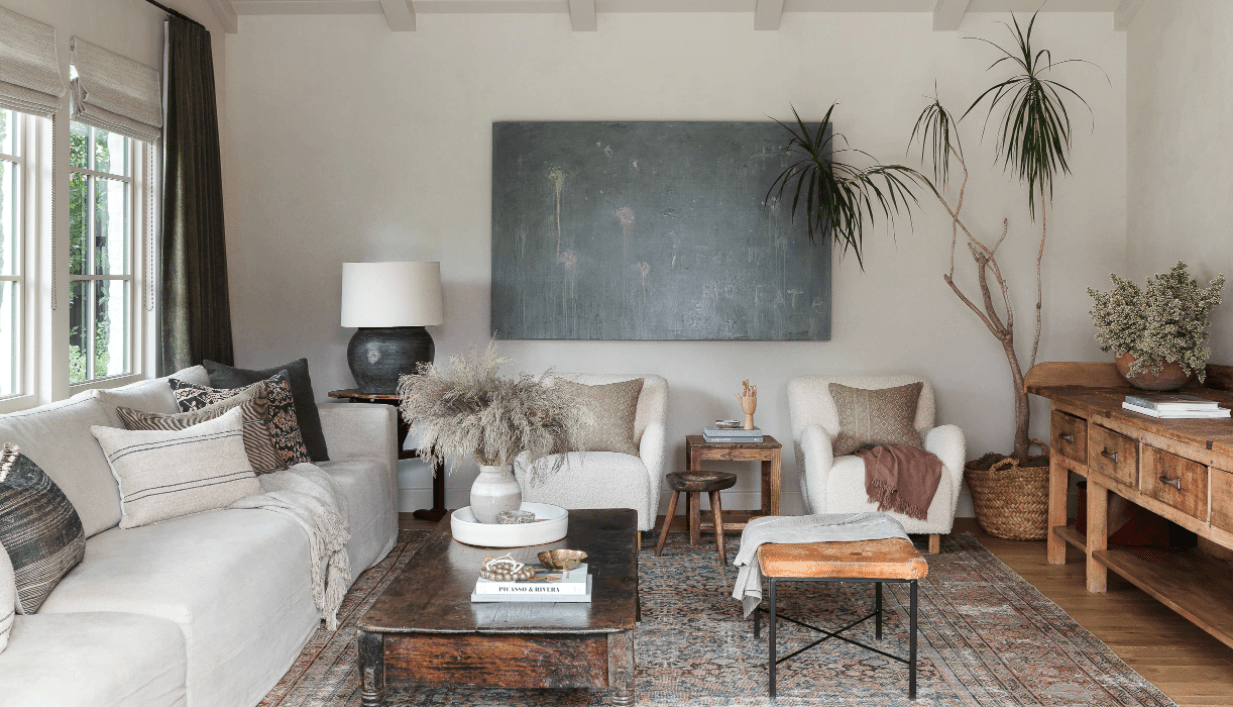 living room with large dragon tree in corner