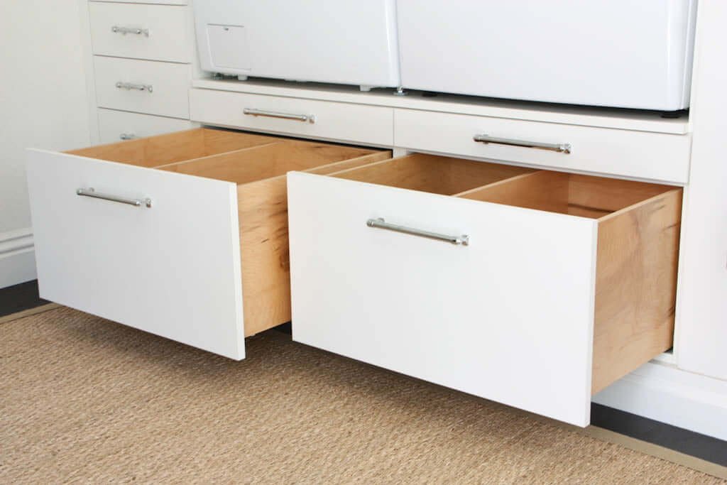 large storage drawers in laundry room makeover