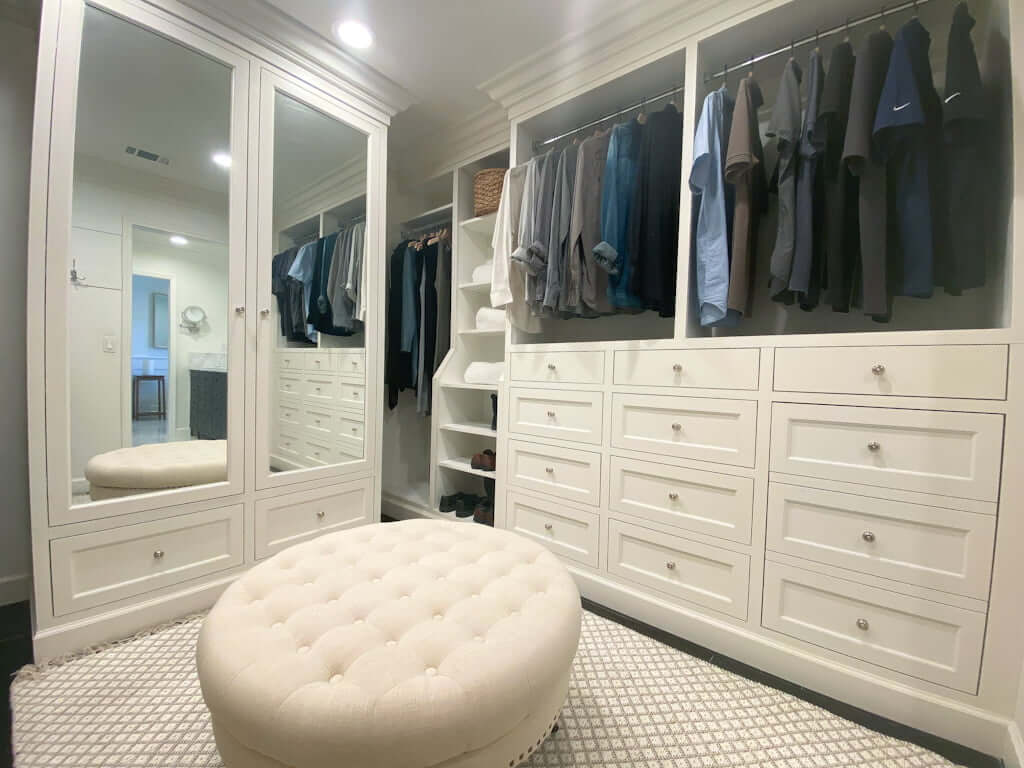 luxury master closet ideas with ottoman and mirrored doors and mirrored cabinets