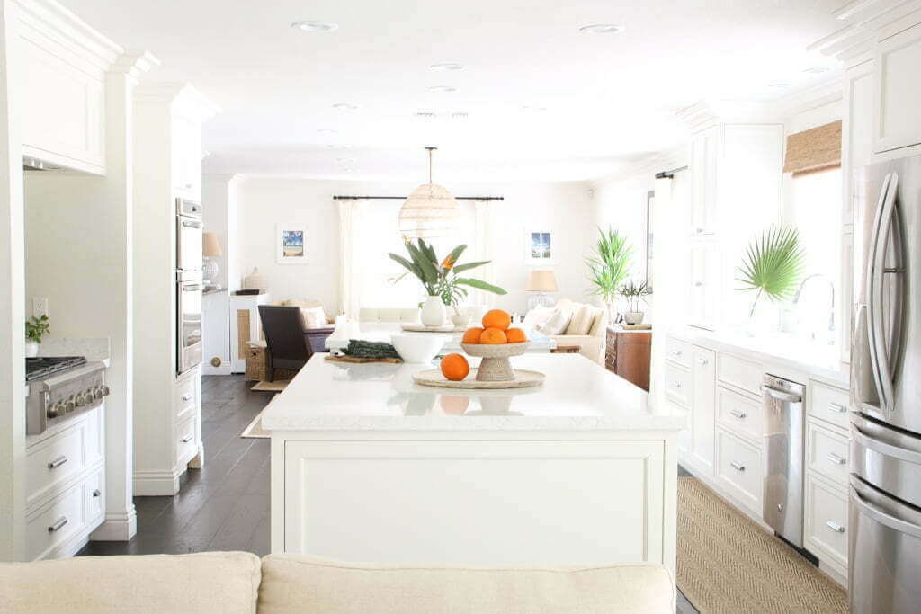 large galley kitchen with white quartz countertops