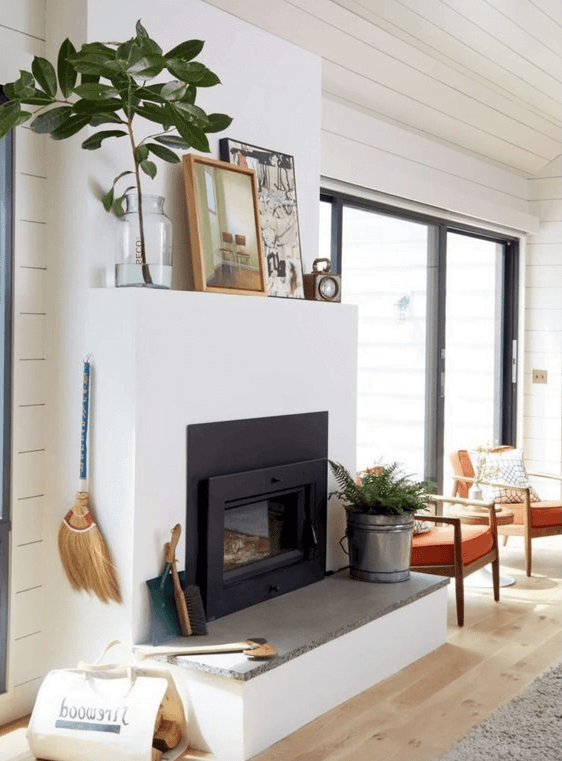 white simple fireplace with modern fireplace mantel decor