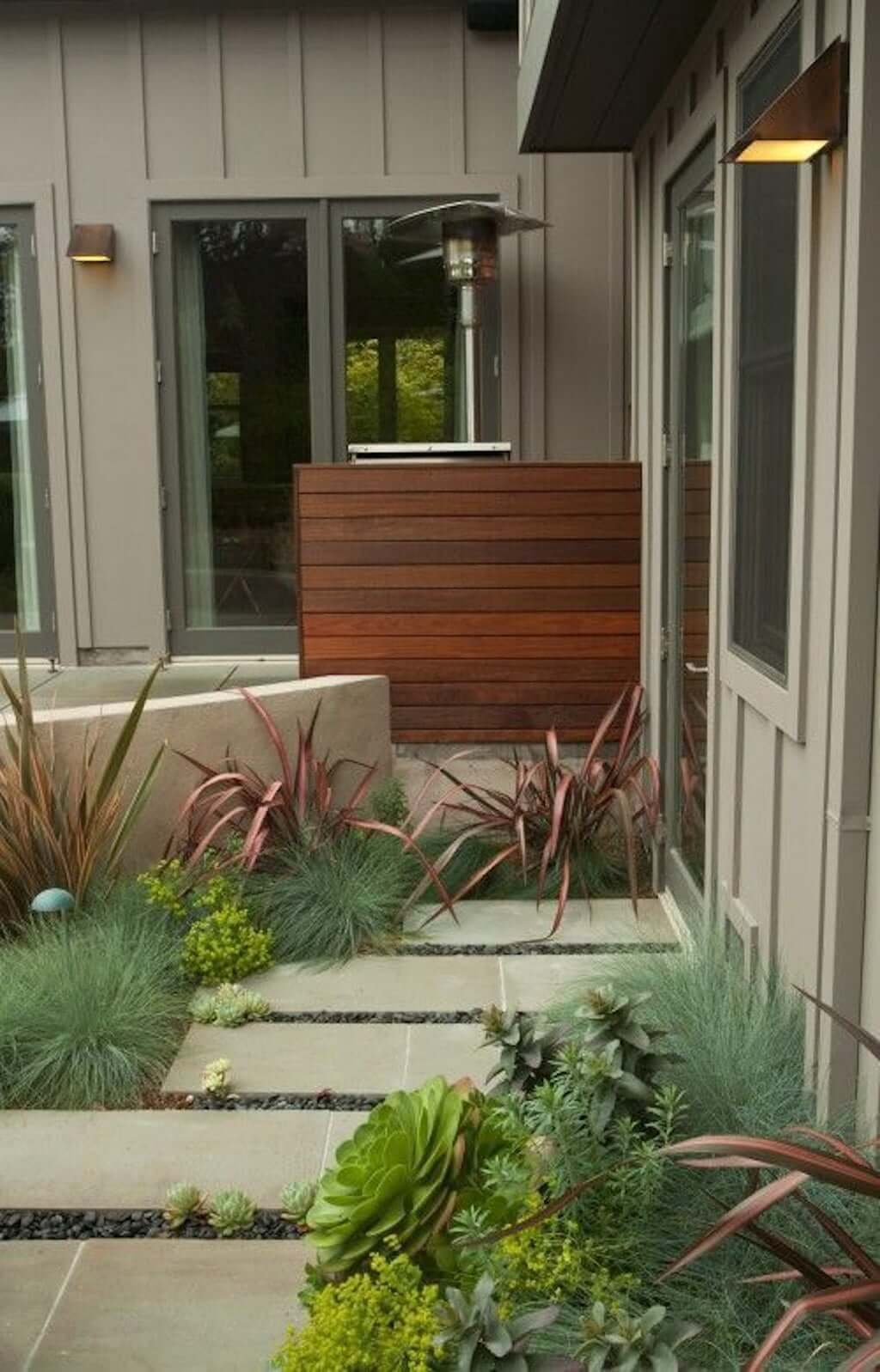 pool equipment hidden behind wood wall with horizontal pieces of wood