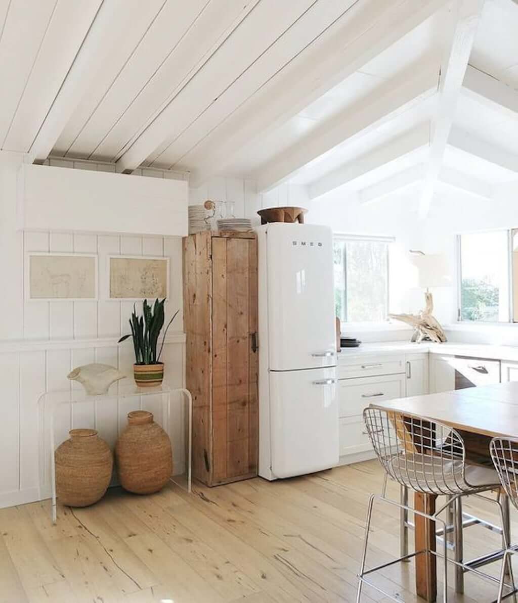 wood floors in beach house kitchen with white and wood