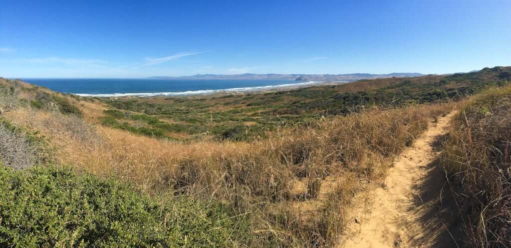 view from Montana de Oro over dunes toward Morro Bay with ocean