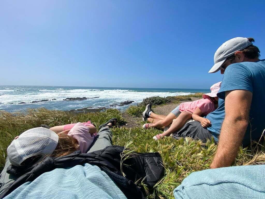 family in Montana de Oro looking over tide pools