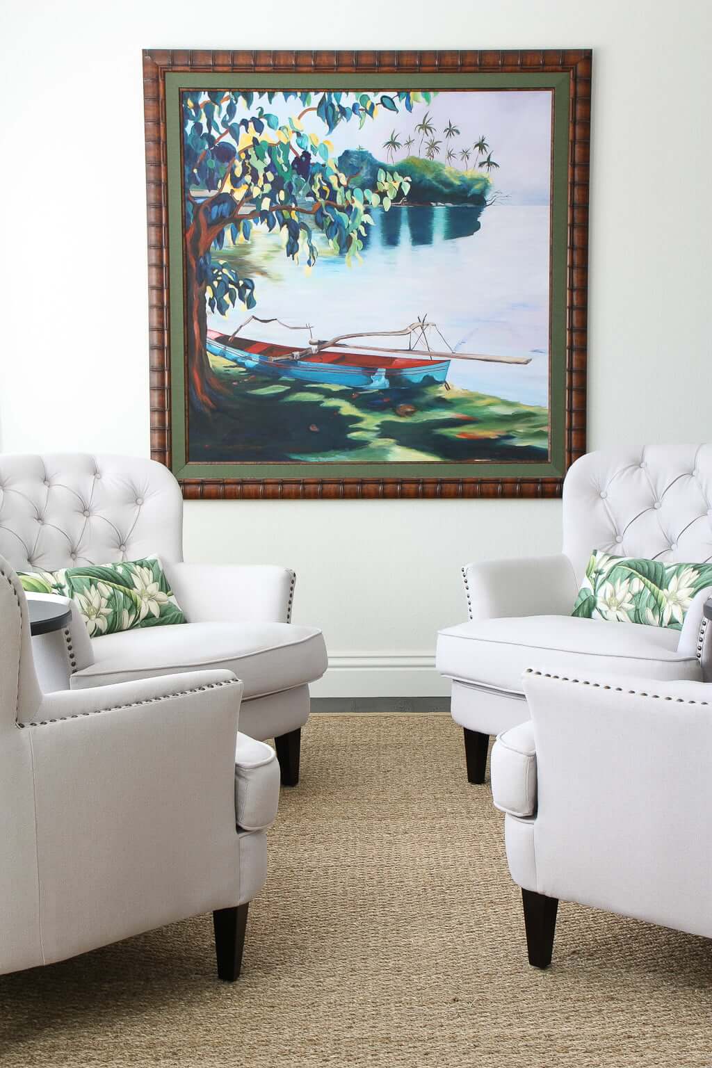extra large painting coastal in living room with four tufted chairs in a circle facing each other