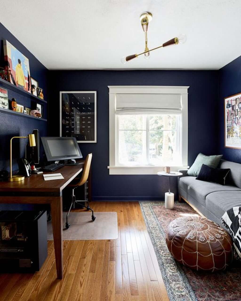 dark navy blue wall office with sofa