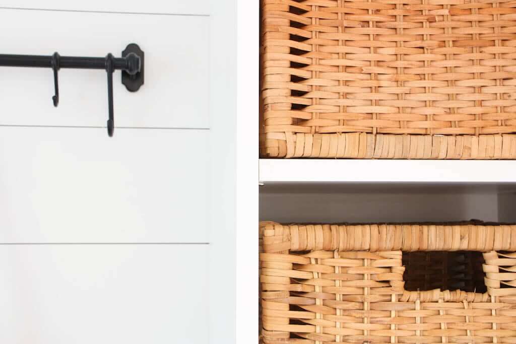 baskets and hooks in a mud room
