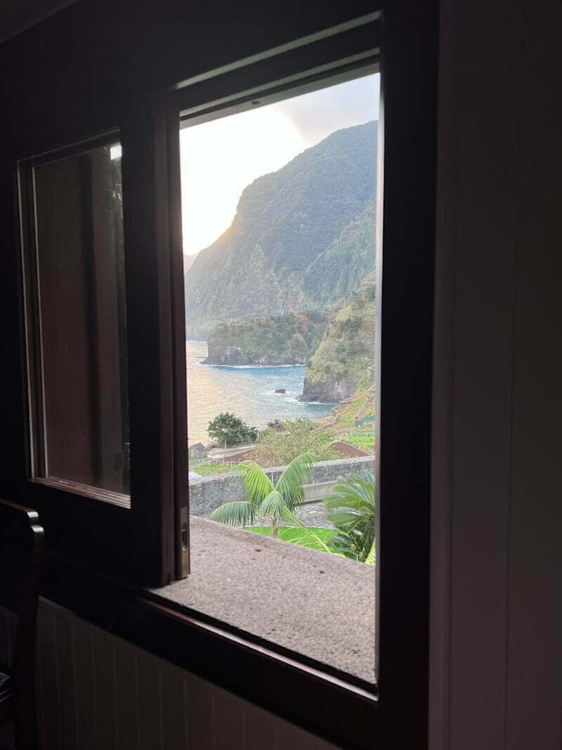 view through window of Madeiran coast and ocean