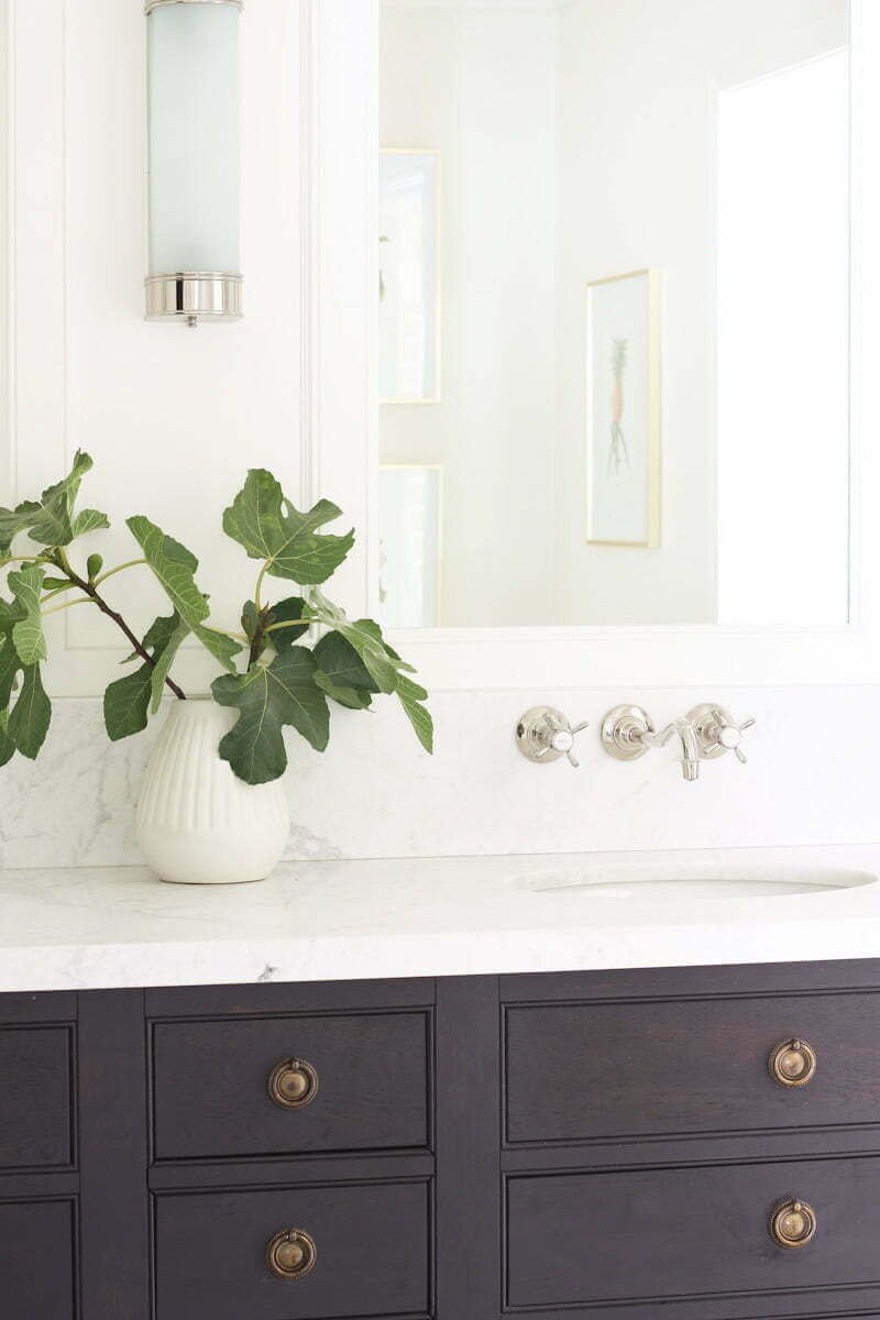 bathroom vanity with polished nickel wall mount faucet