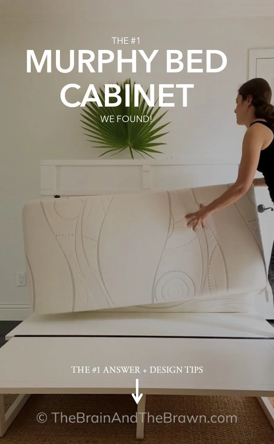 a woman showing how to put away a folding murphy bed cabinet in a white room with a green plant