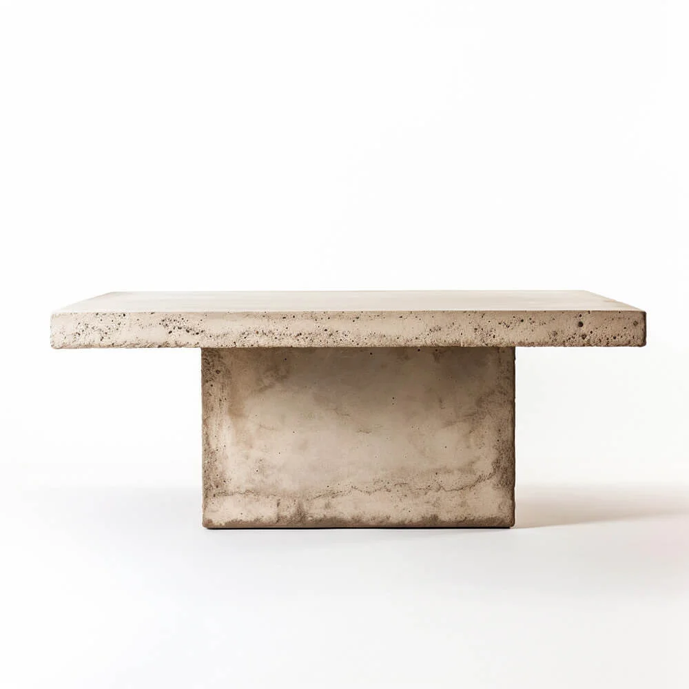 Plaster dining table with singular, large base