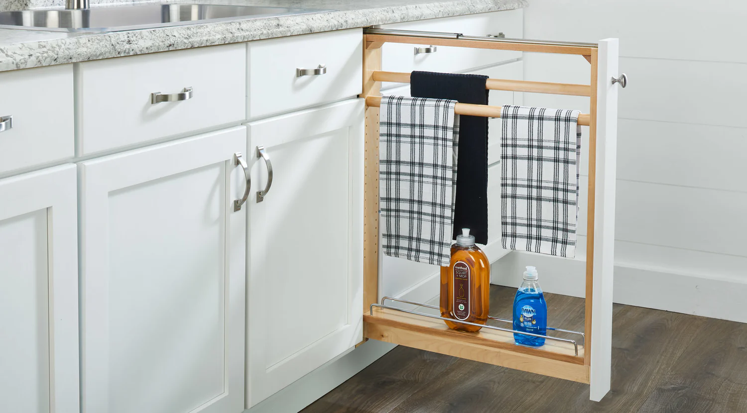 White kitchen cabinet with a skinny cabinet pull-out.