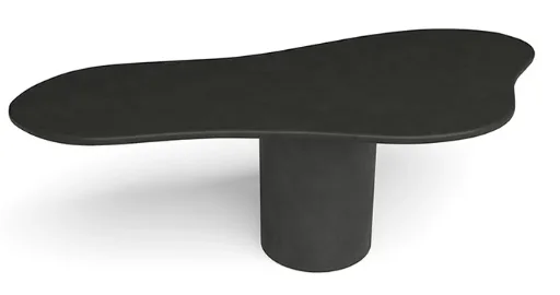 A black, custom plaster dining table with unique table top shape and a round singular base 