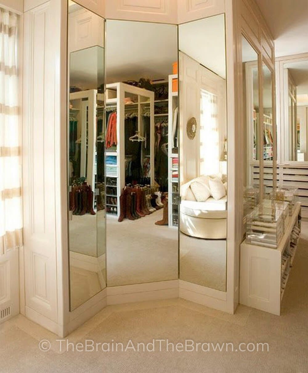 closet with mirrors in corner like a dressing room, walk in