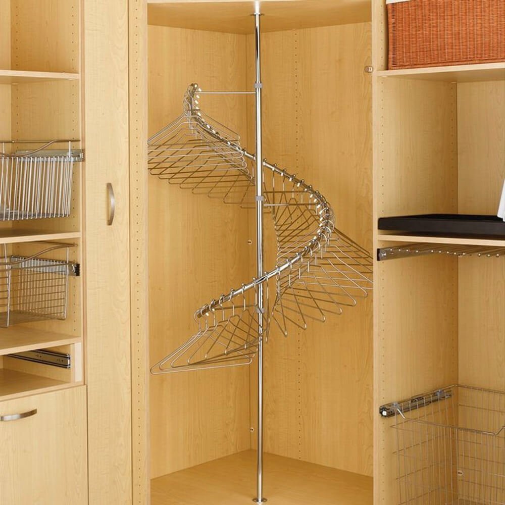 closet corner with curving hanging rod swirling around central rod