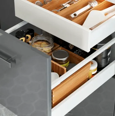 A small pre-made drawer opens within a larger premade drawer with no sides 