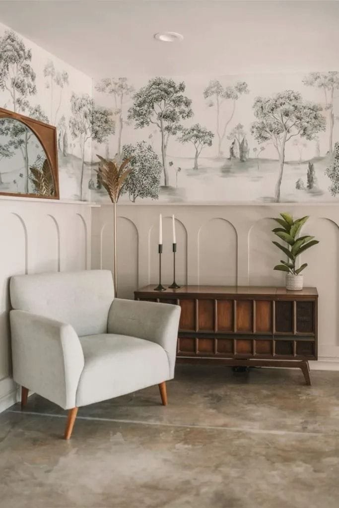 Unique decorative wall panelling idea with curved half wall paneling and wallpaper above the paneling