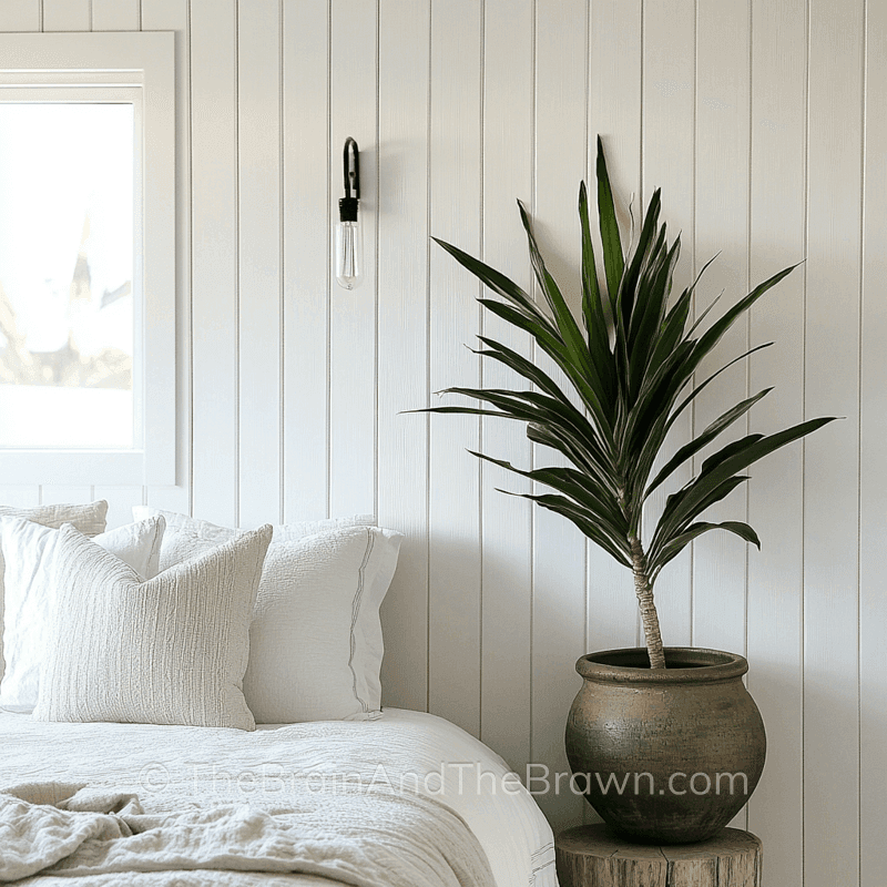 Vertical shiplap wall panelling idea for bedroom painted white 