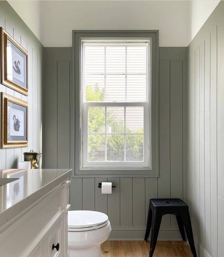 half wall wood paneling idea with vertical shiplap painted grey