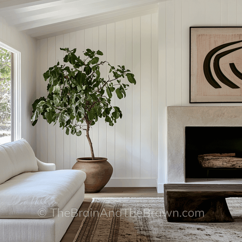 Vertical wall paneling idea in a living room with a stone fireplace