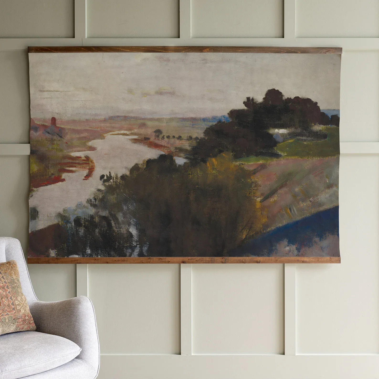 Large landscape tapestry on paneled wall, neutral and dark moody colors