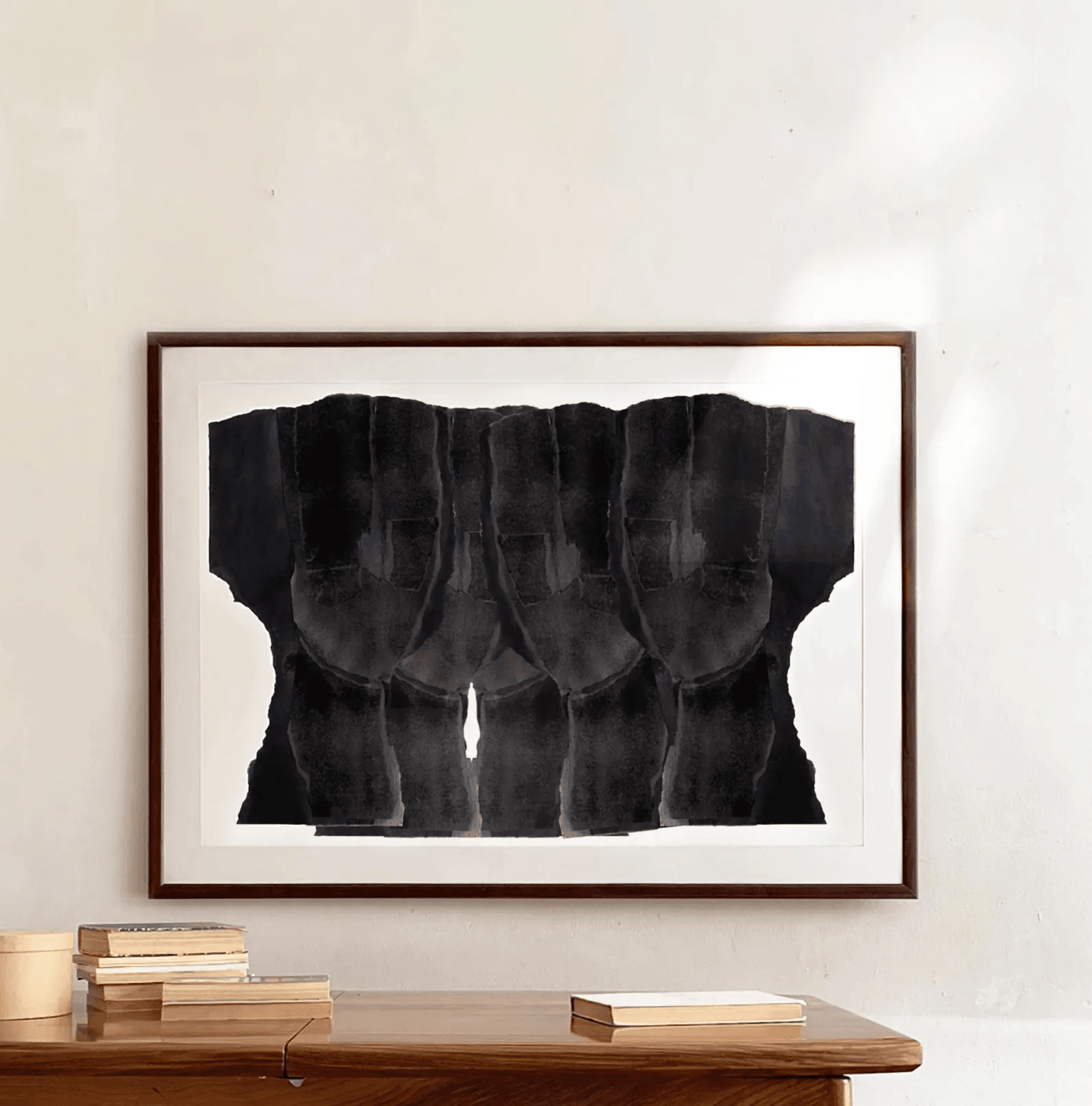 framed piece of black abstract wall art 