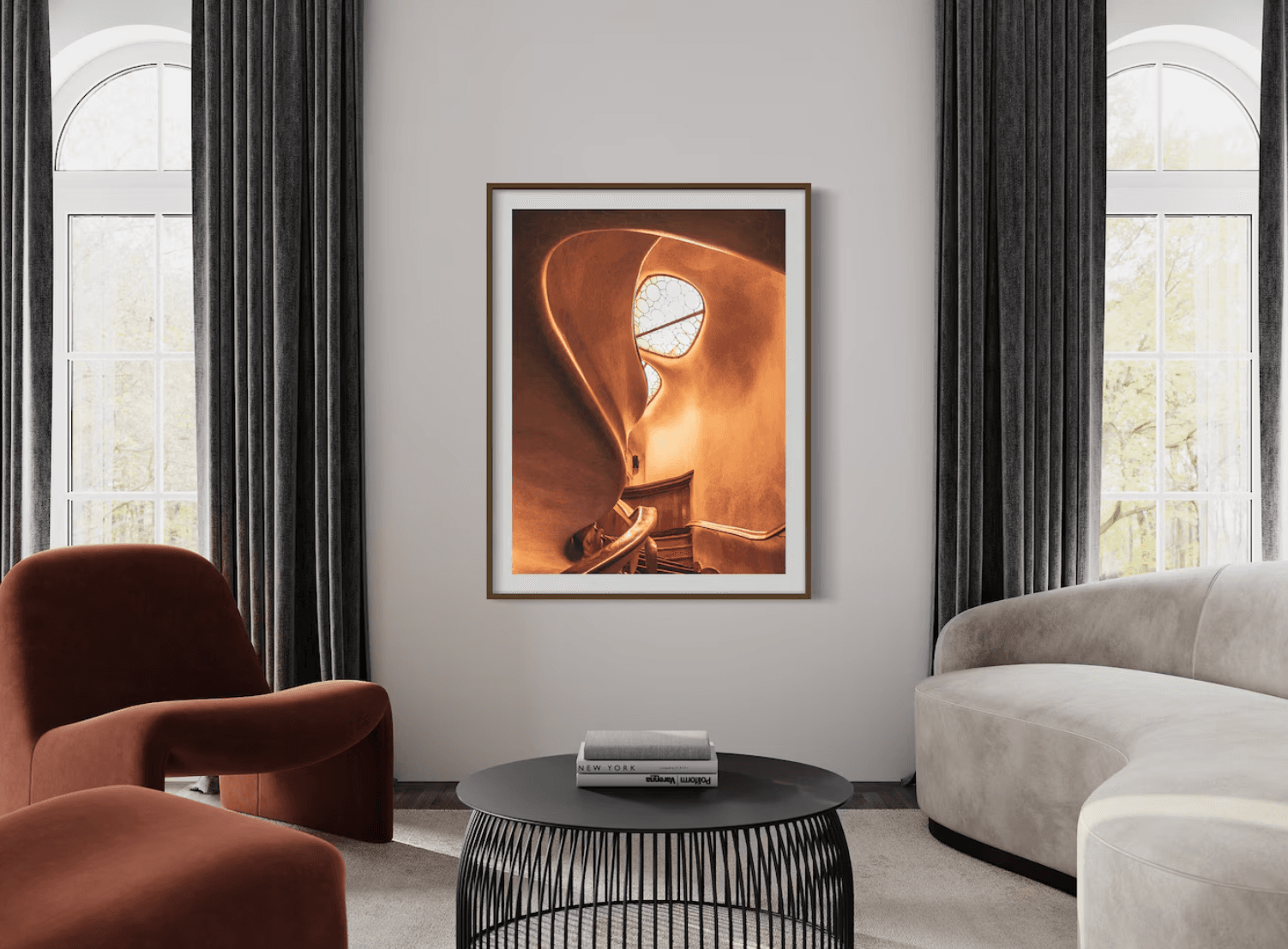 Living room with a piece of modern Spanish photography hanging on the wall between two windows 