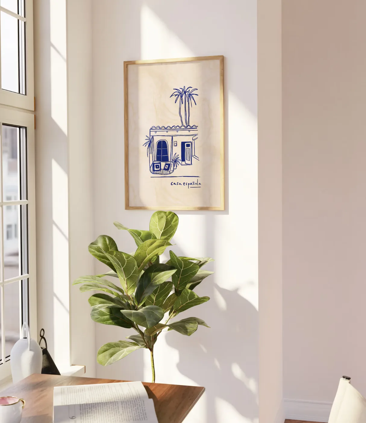 A corner of a home with a modern Spanish artwork hanging on the walls