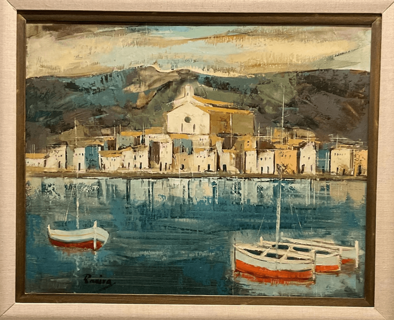 Spanish style wall art of a village of  overlooking the ocean with sailboats in the ocean